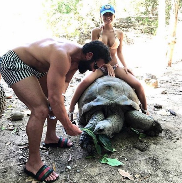Dan Bilzerian Sofia Bevarly sits on top of tortoise 850267