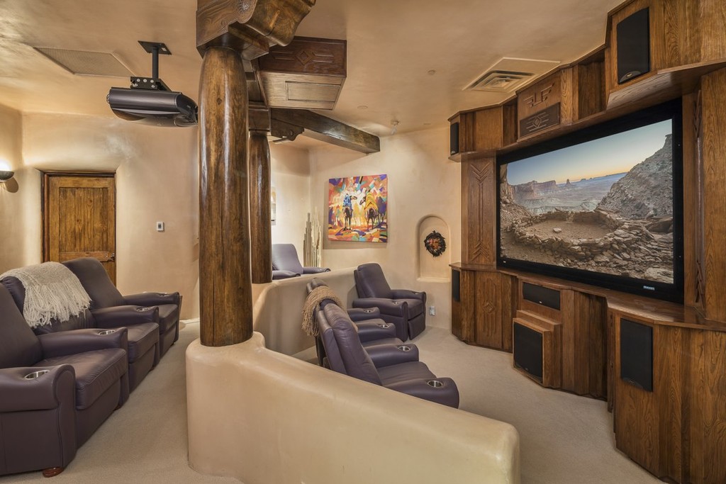but the home has its fair share of more extravagant amenities as well like this home theater | Lamianow.gr
